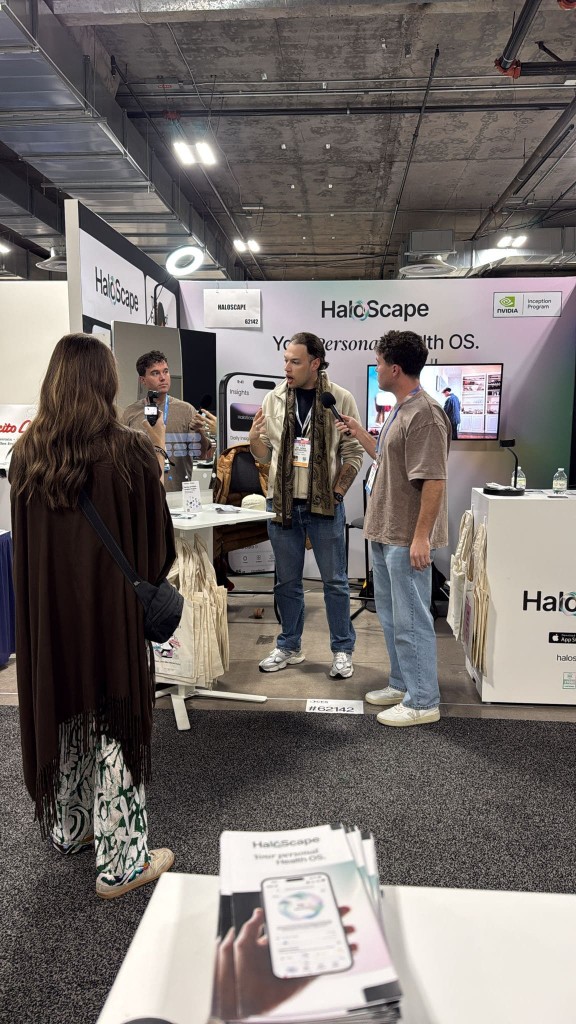 HaloScape booth at CES 2026 with visitors exploring the Health OS platform